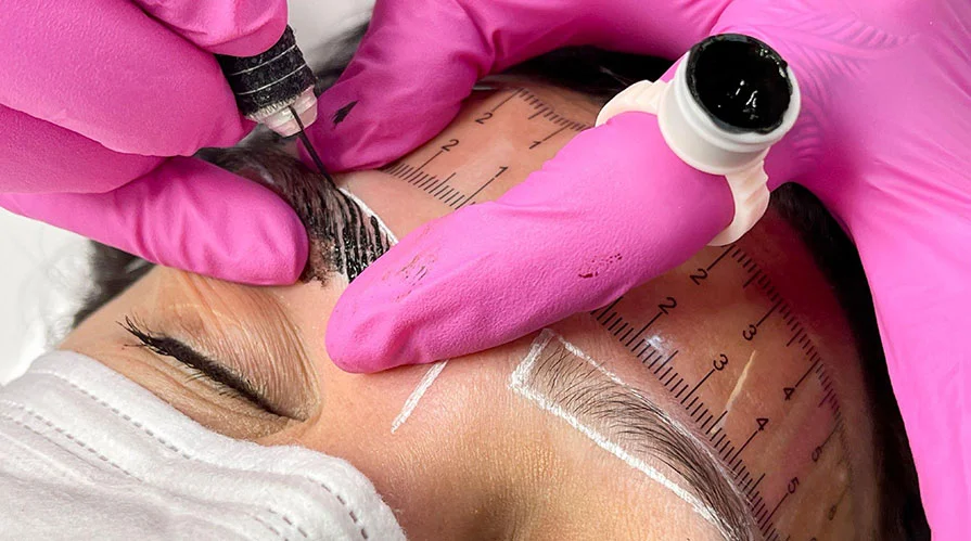 Professional cosmetic tattooing application - microblading eyebrows to save time on daily makeup routine